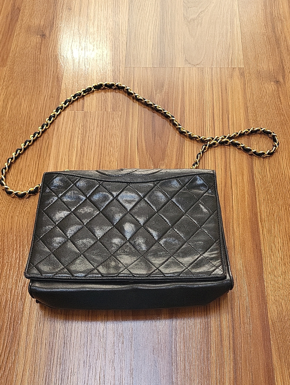 CHANEL Vintage Collectible Black Quilted Leather Crossbody with Gold Chain Strap